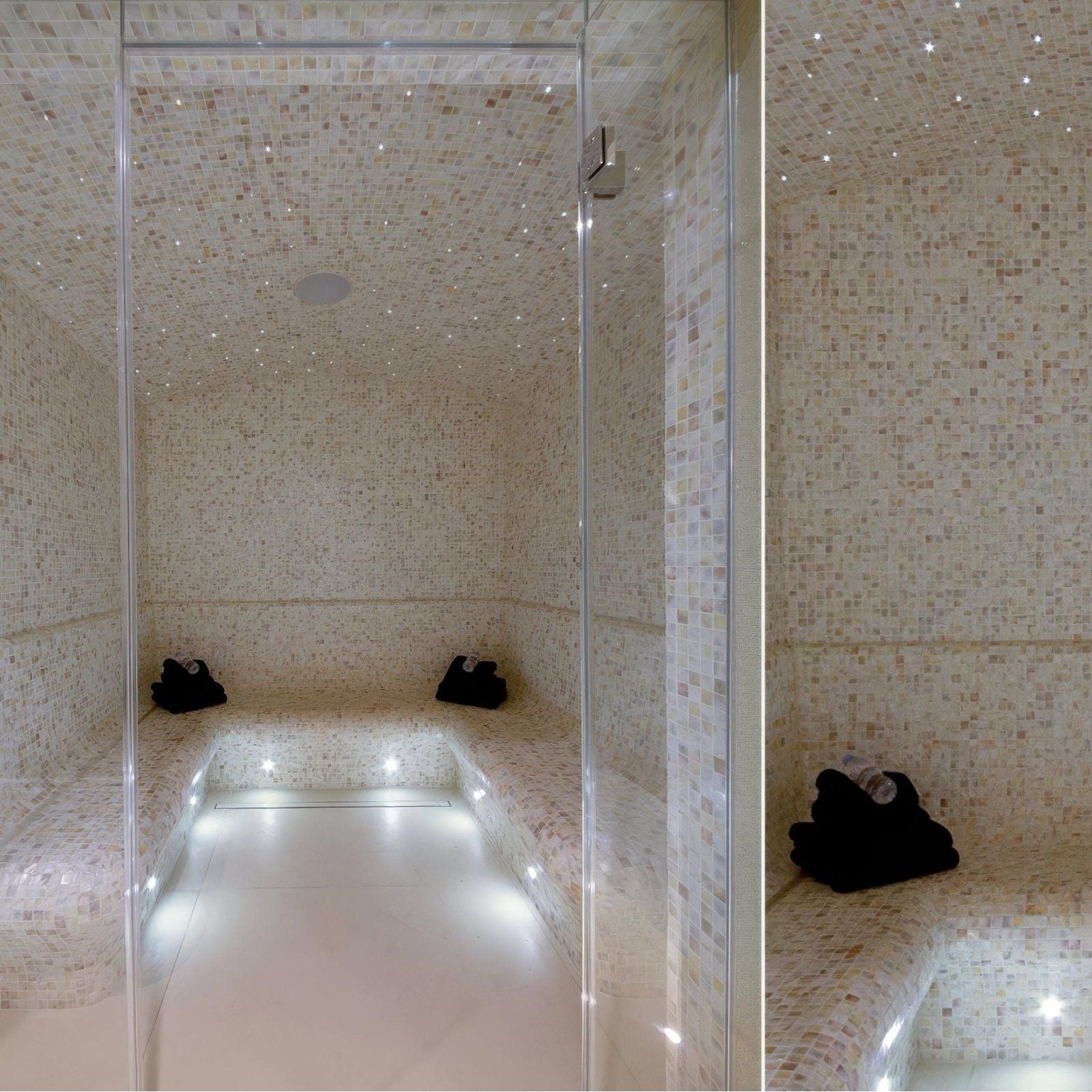 Natural 25mm square transparent glass door with silver handle framing an elegant mosaic tiled sauna entrance