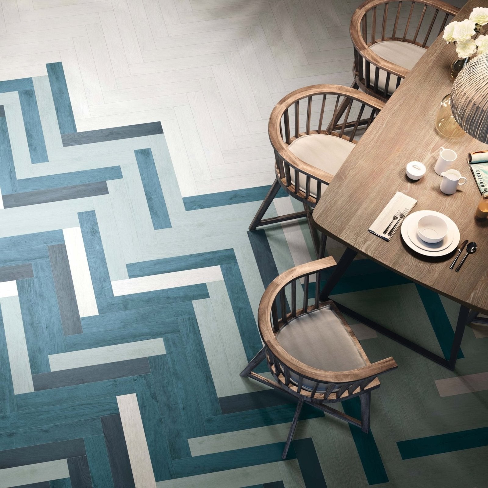 The nebraska white matt 60x10cm wood-like tiles feature a blue and white herringbone floor pattern