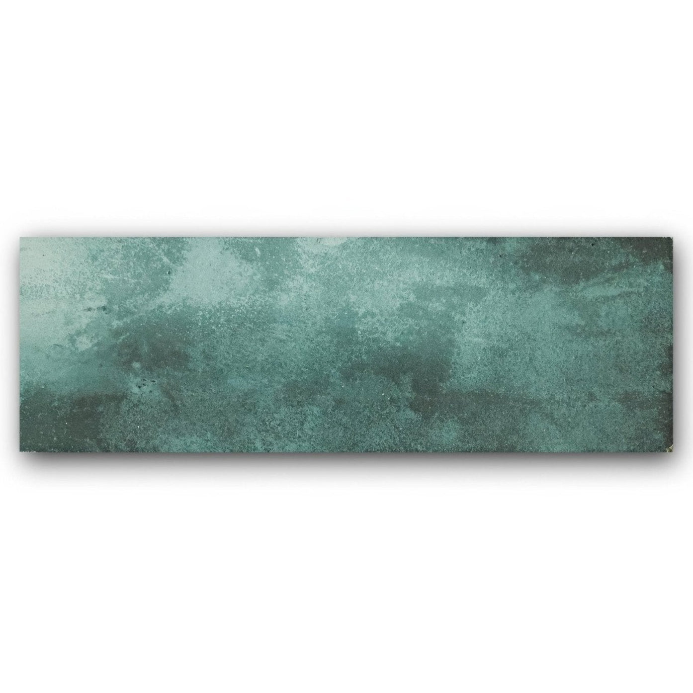A rectangular ceramic tile with a textured mottled teal and green patina finish nebula green 10 x 30cm