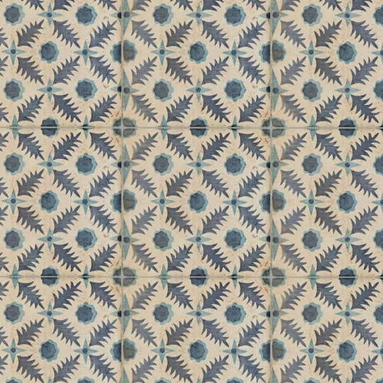 Vintage-style ceramic tiles featuring a repeating dark blue and teal leafy pattern on an off-white background by neisha crosland