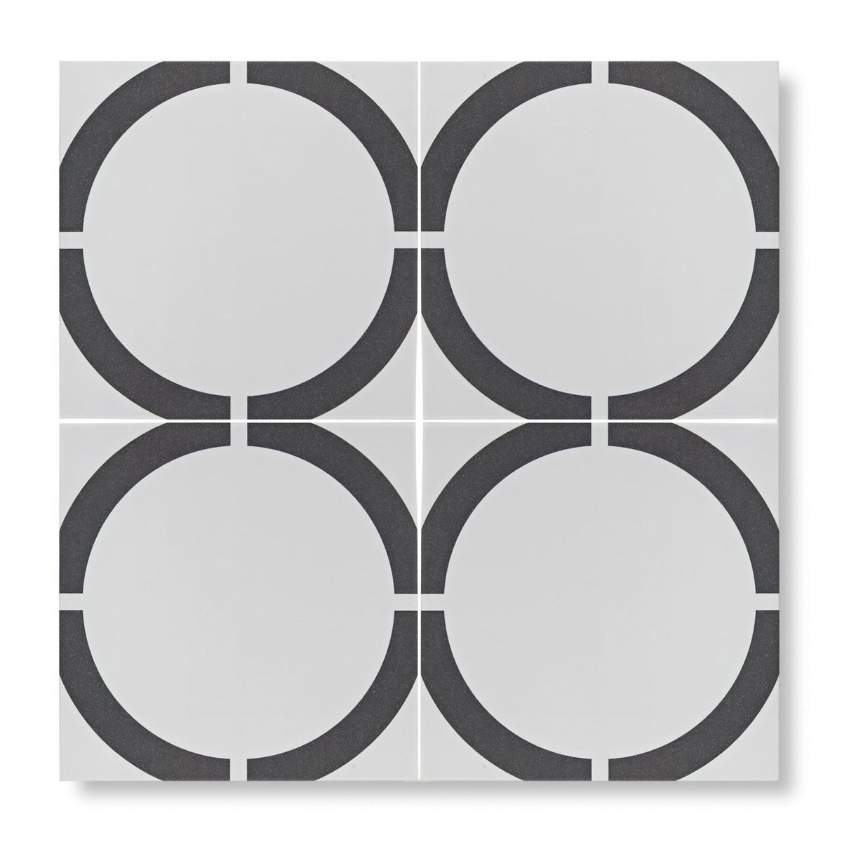 Gray and white geometric patterned tile with interlocking circular designs from neisha crosland tulia hula hoop black collection