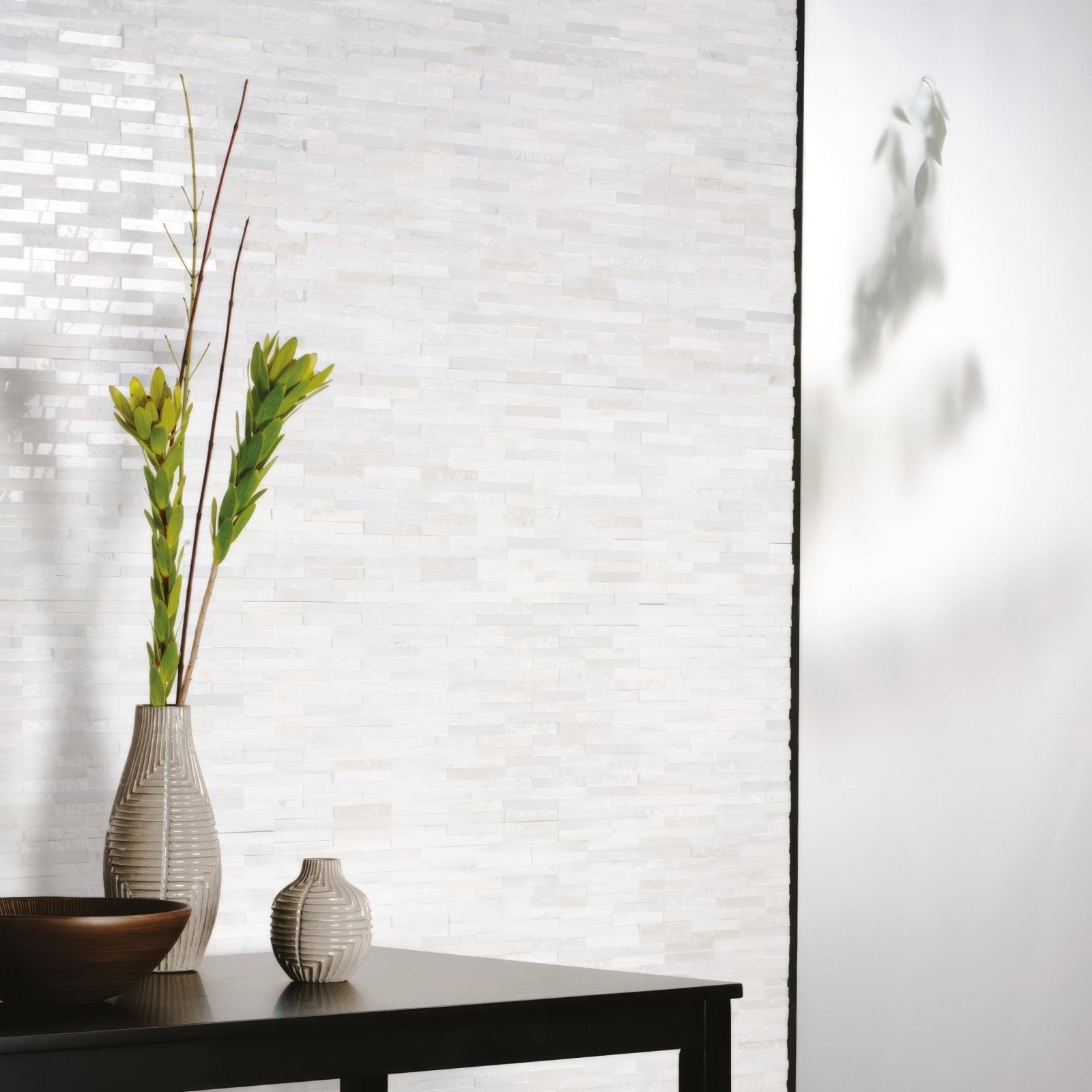 Tall slender ceramic vase with vertical ribbed texture in muted gray finish for neve linear stone mosaic collection