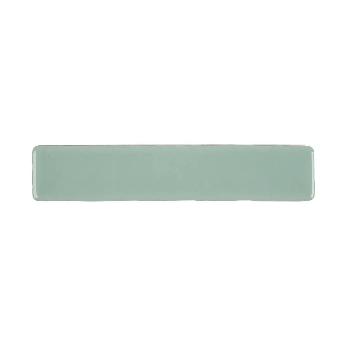 A sleek rectangular ceramic wall tile with a smooth matte sage green finish from Nina Campbell Rivage Aqua Glazed collection