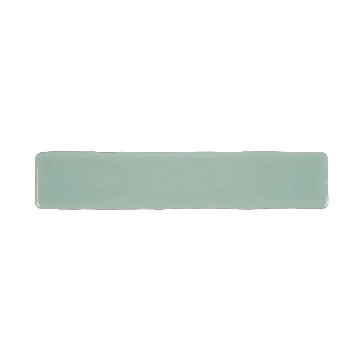 A sleek rectangular ceramic wall tile with a matte finish in soft mint green from Nina Campbell Rivage Aqua Glazed collection
