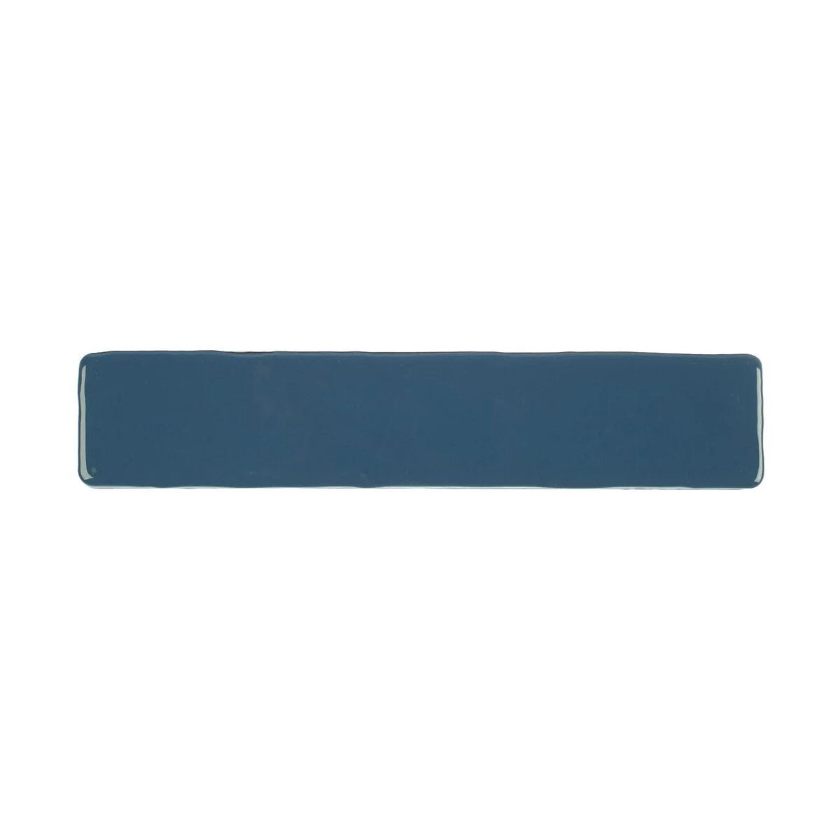 A sleek navy blue ceramic Nina Campbell Rivage Indigo glazed wall tile with smooth glossy edges and rectangular shape