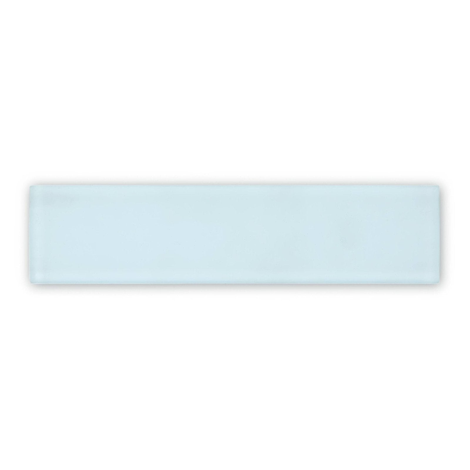 A sleek rectangular glass tile with a soft aqua hue and polished edges from nordic glass geyser collection