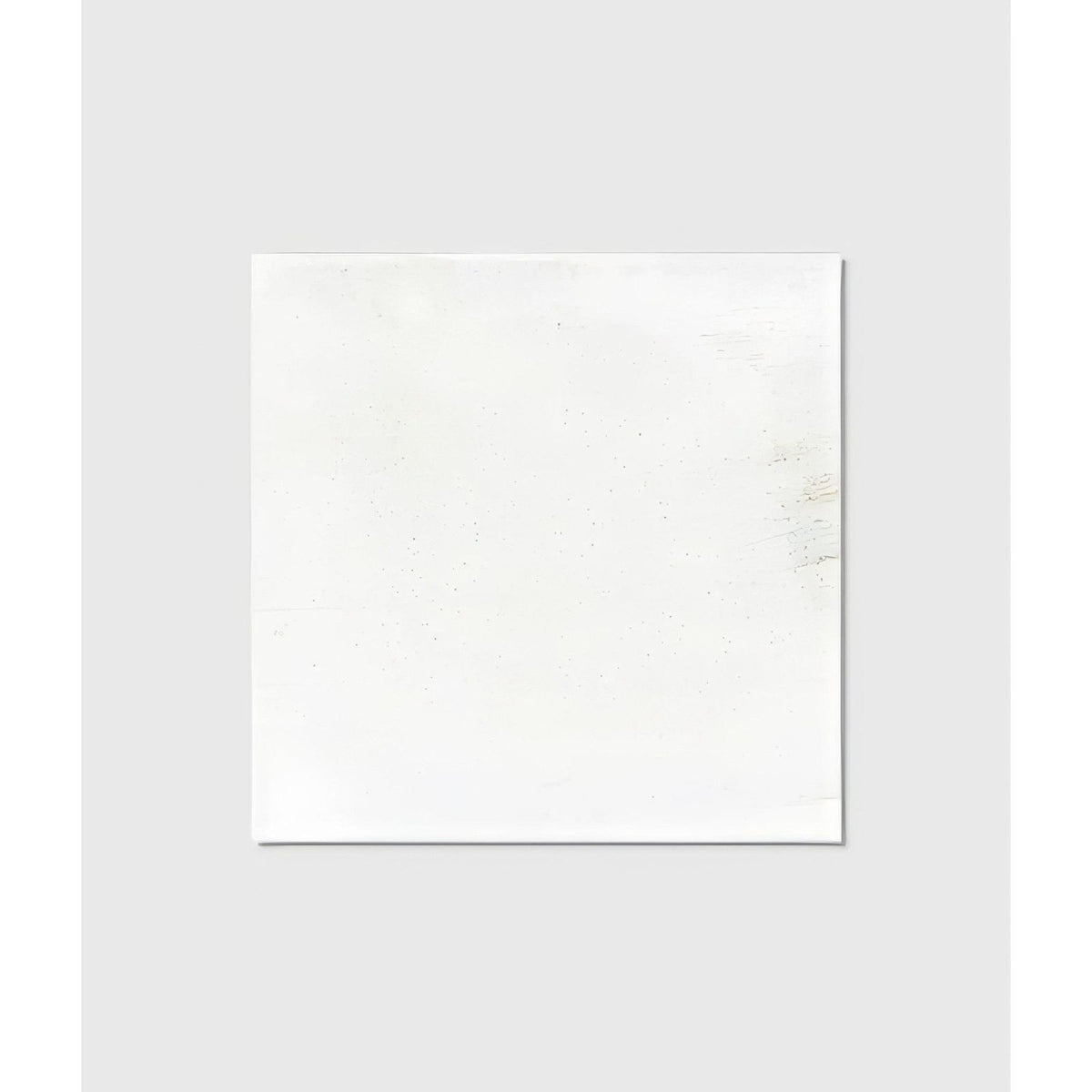 White square ceramic canvas with subtle speckled texture from nuance ceramic for artistic use