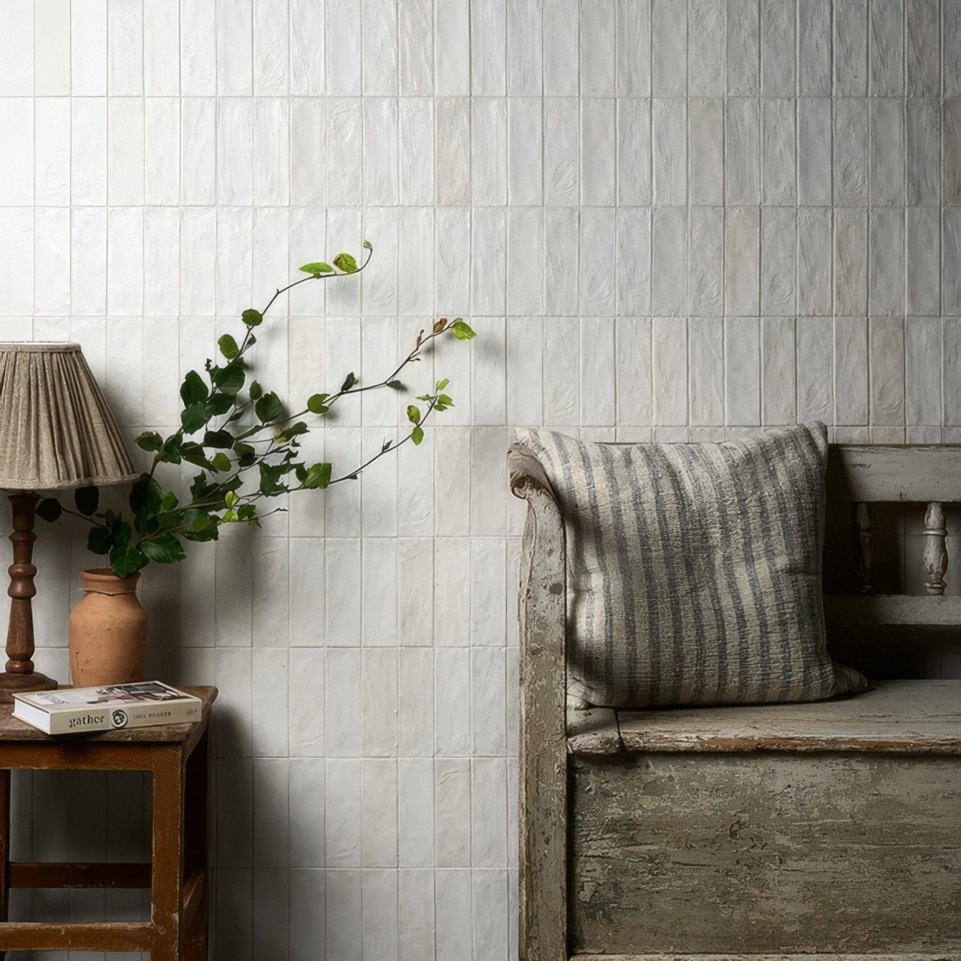 White textured rectangular ceramic tiles cover the wall in oasis veloute ceramic white matt design