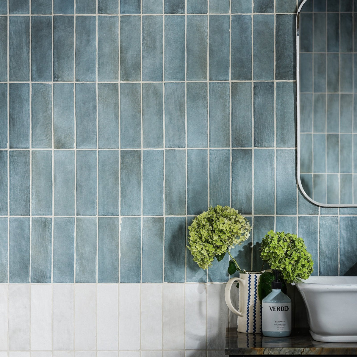 Oasis Veloute Ceramic Powder Blue Matt powder-blue ceramic wall tiles in a brick pattern
