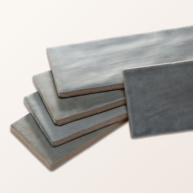 Oasis Veloute Ceramic Powder Blue Matt stacked powder-blue ceramic tiles with a matt textured surface