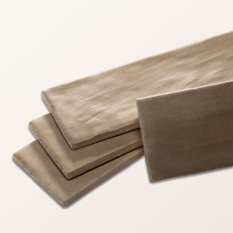 Beige rectangular ceramic stone tiles with textured natural surface in oasis veloute tan matt finish