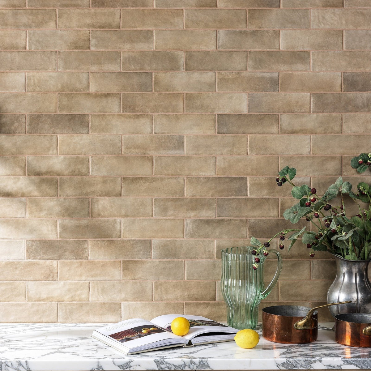 Beige rectangular oasis veloute ceramic tan matt tiles with a subtle matte finish arranged in a staggered brick pattern