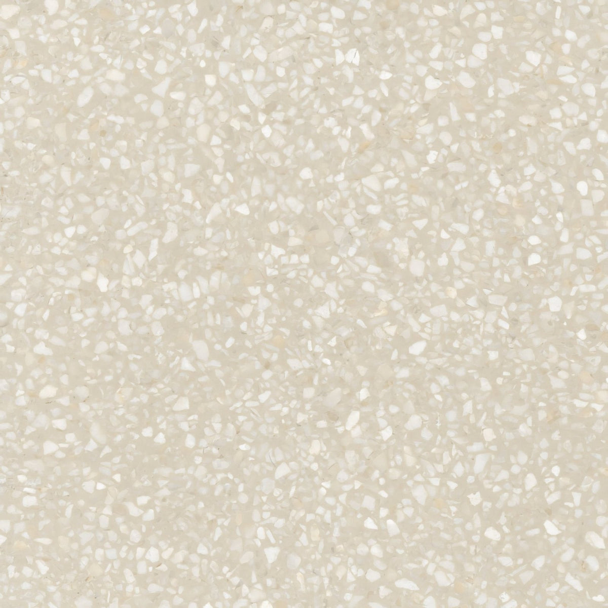 Beige terrazzo tile obi 1855 arena with a speckled pattern of white and light gray fragments