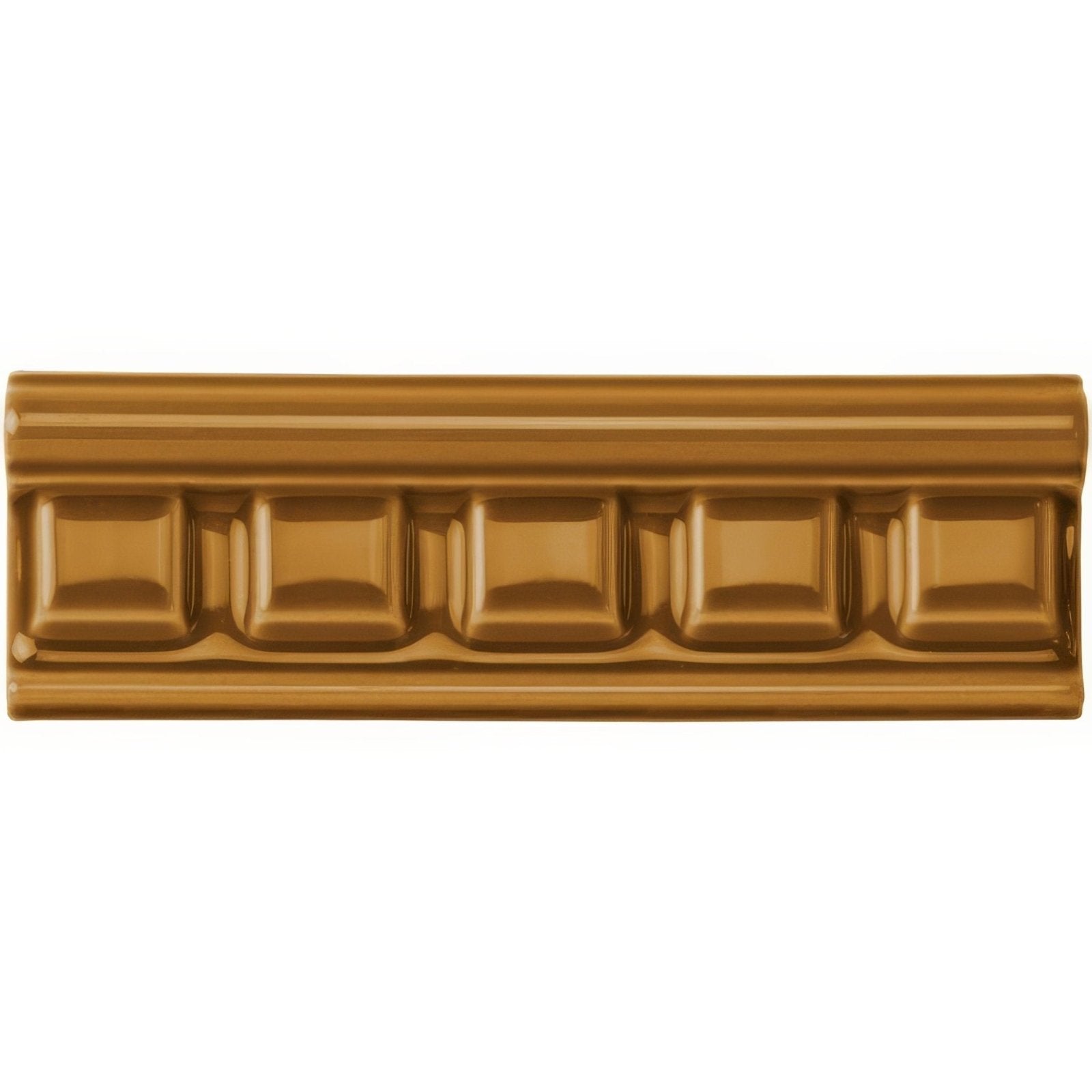 Ochre dentil moulding gold ceramic tile designed to resemble a raised chocolate bar with square segments and glossy finish