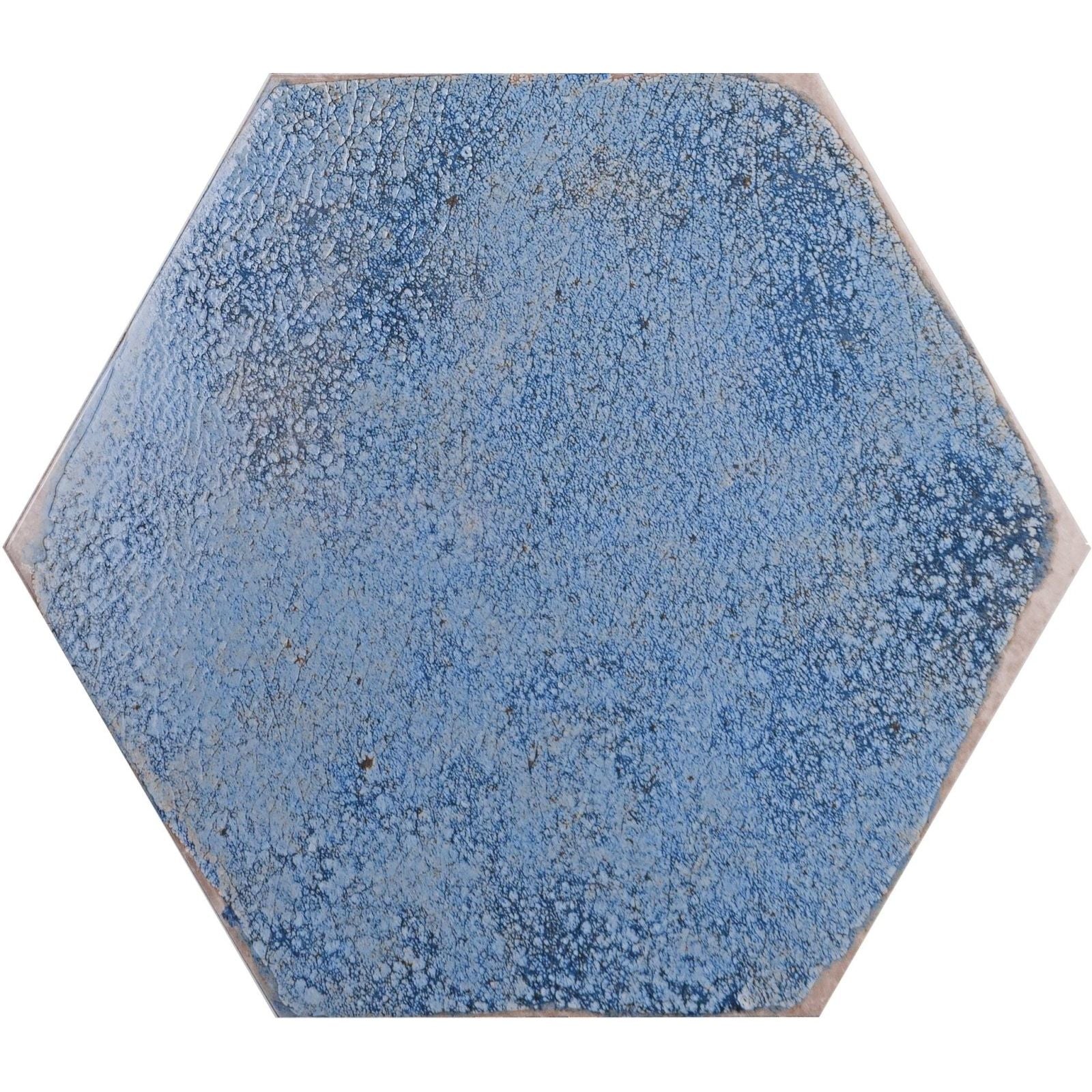 Oken hexagon blue ceramic tile with a textured crackled blue glaze finish ideal for decorative surfaces