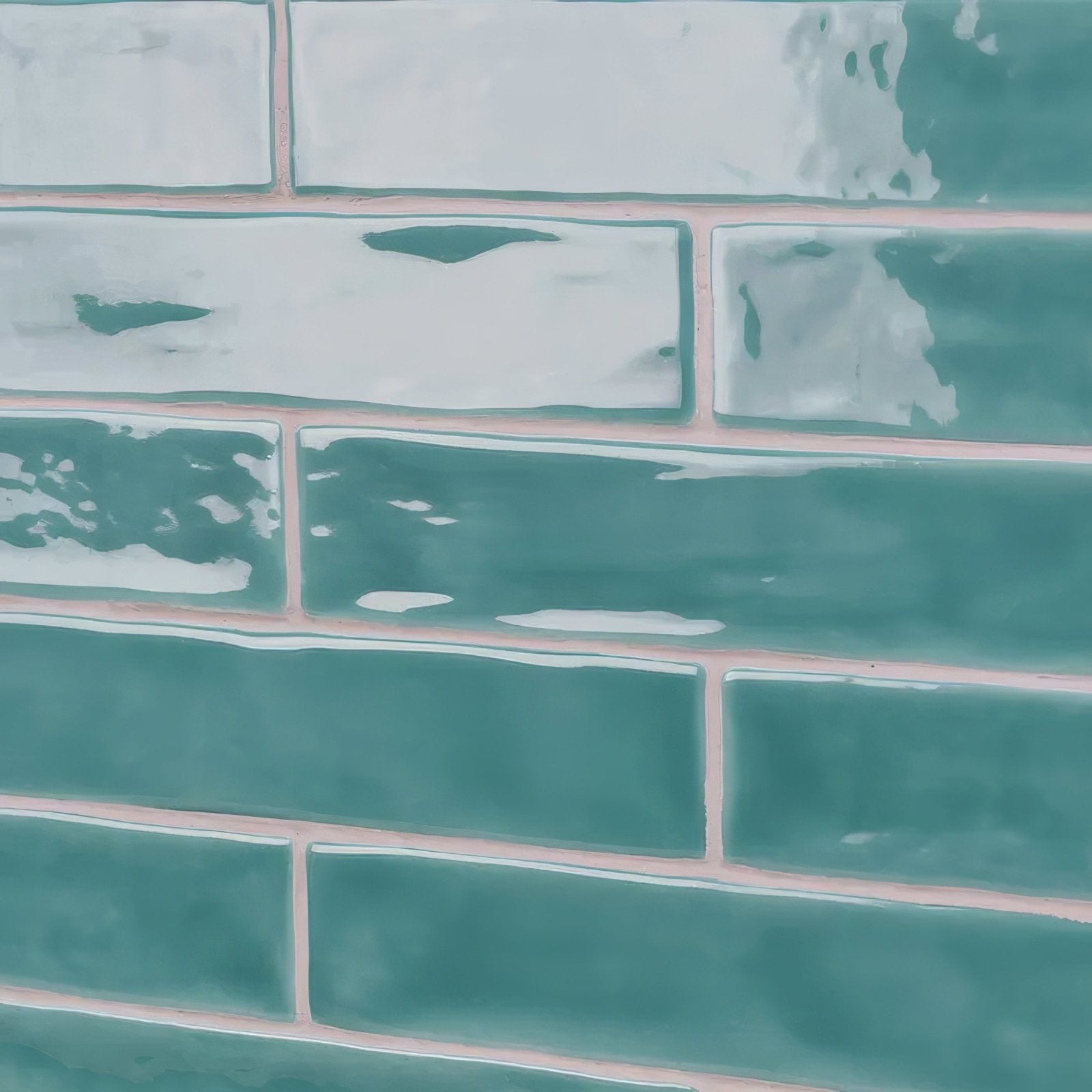 Onda aquamarine wall tiles featuring teal green rectangular subway tiles with a glossy finish and white glaze accents