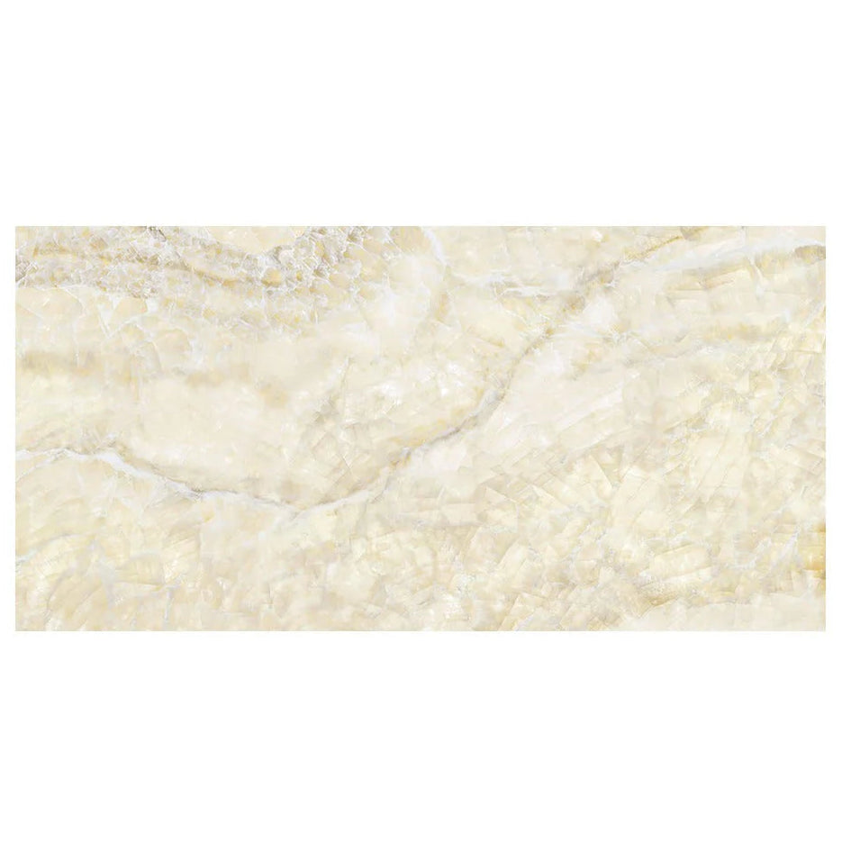 Onyx lumi ivory polished marble effect tile 60 x 120 with cream-colored marble and subtle veining on a reflective surface