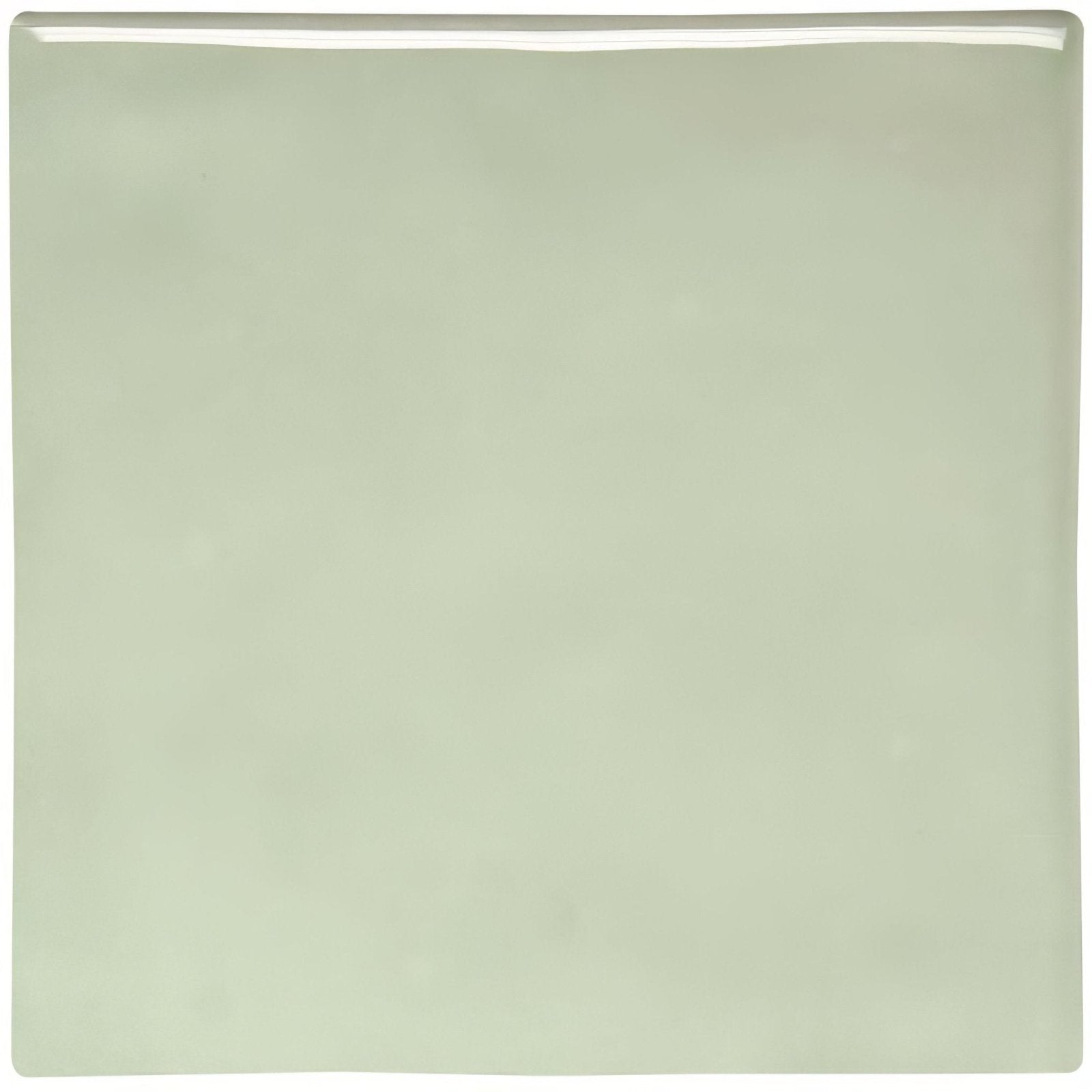 A smooth square ceramic tile with a matte sage green finish called orford field tile