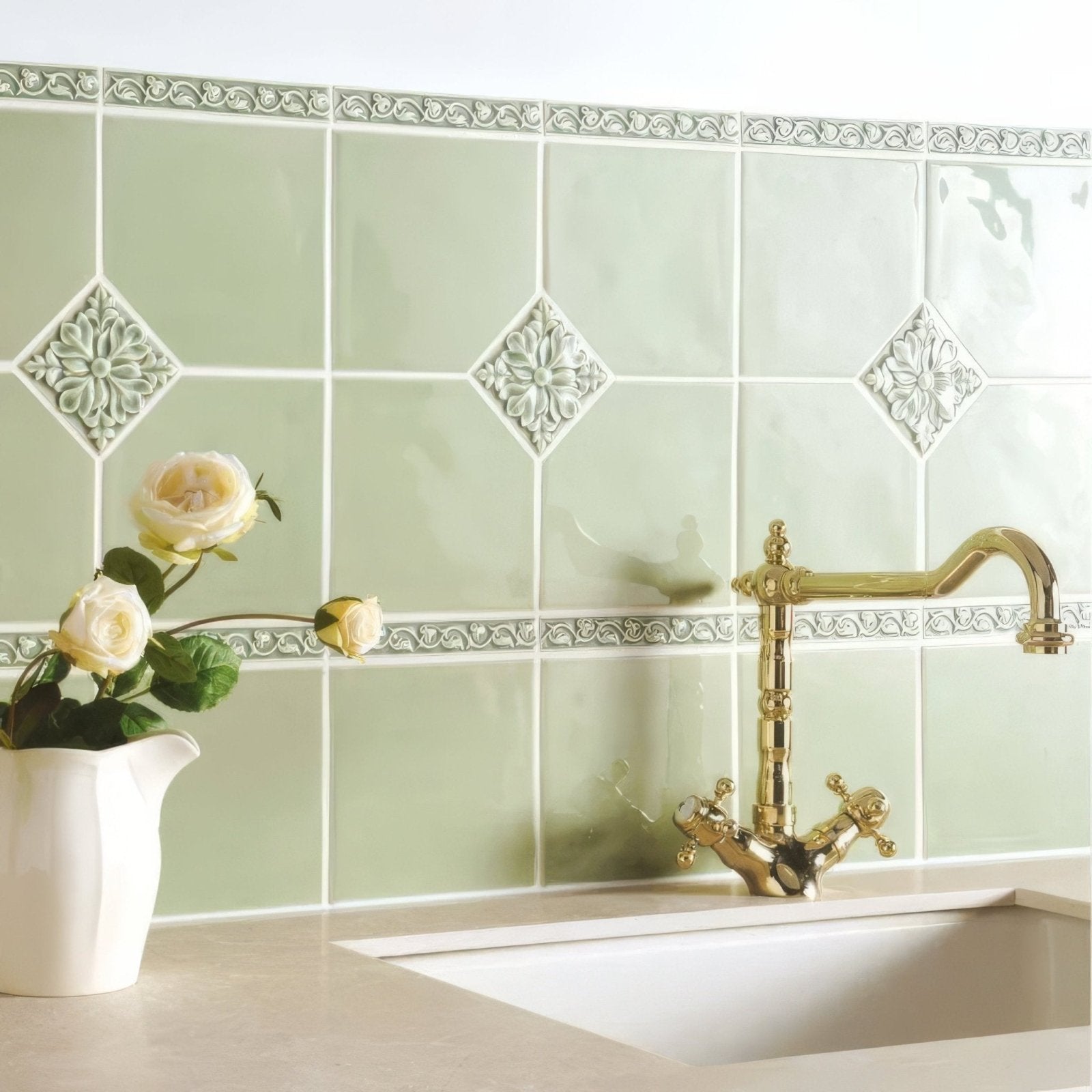 Orford Hampstead light green ceramic tiles with raised diamond floral patterns and decorative borders for kitchen backsplash