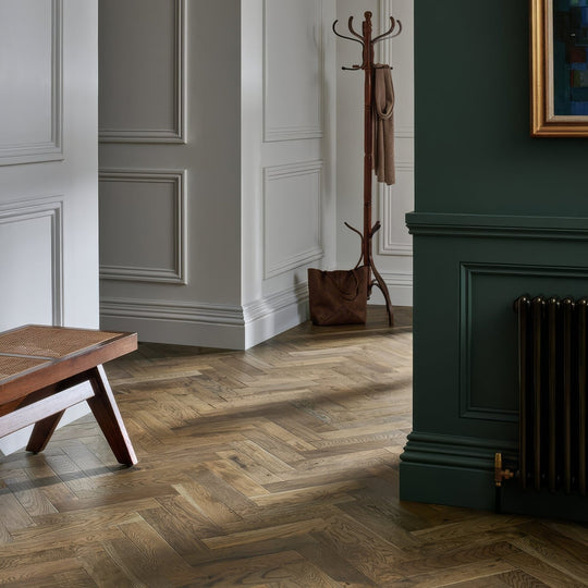 Orkney Fauna Oak warm-toned oak hardwood floor in classic herringbone pattern for elegant interior flooring