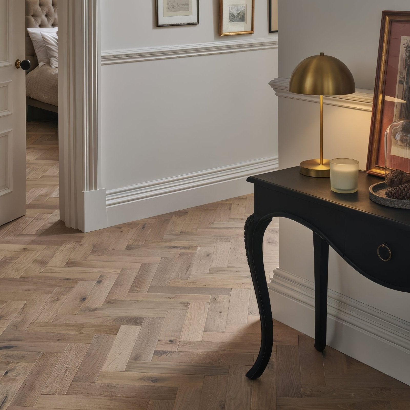 Light-colored wood herringbone floorboards in orkney pewter oak showcasing natural oak texture and finish
