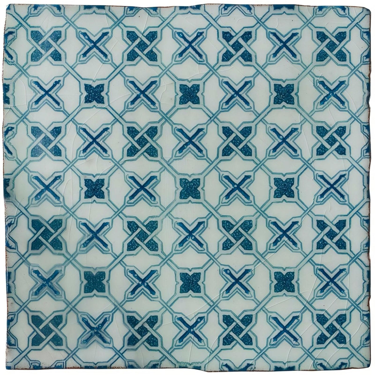A square ceramic tile called ormeaux blue on mint featuring a repeating blue cross geometric pattern on white background