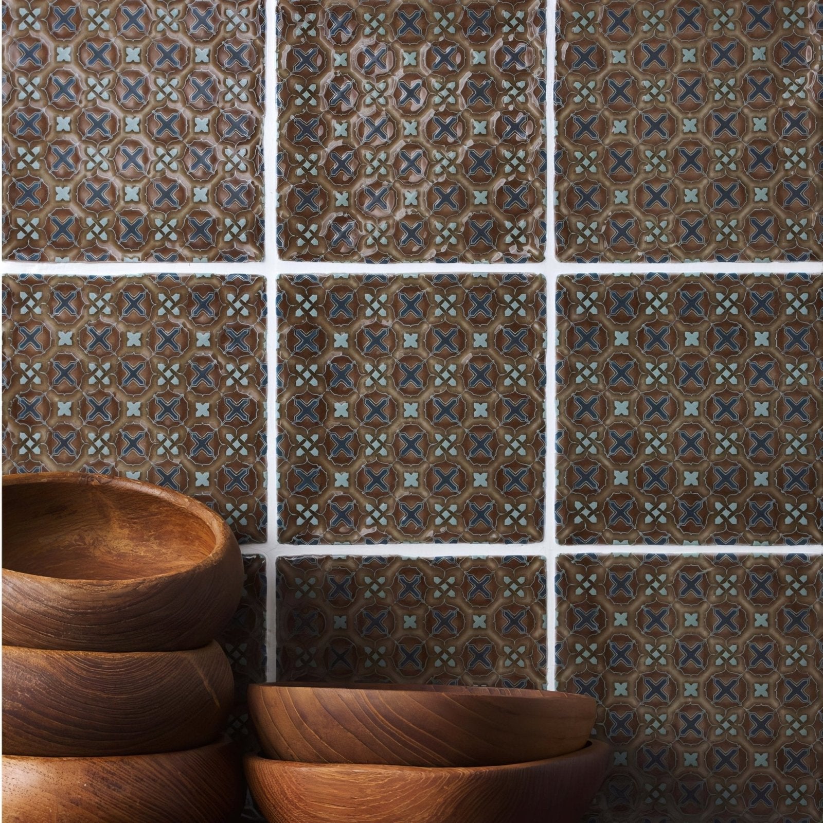Stack of warm brown wooden bowls with visible grain and smooth rounded edges from ormeaux on chestnut collection
