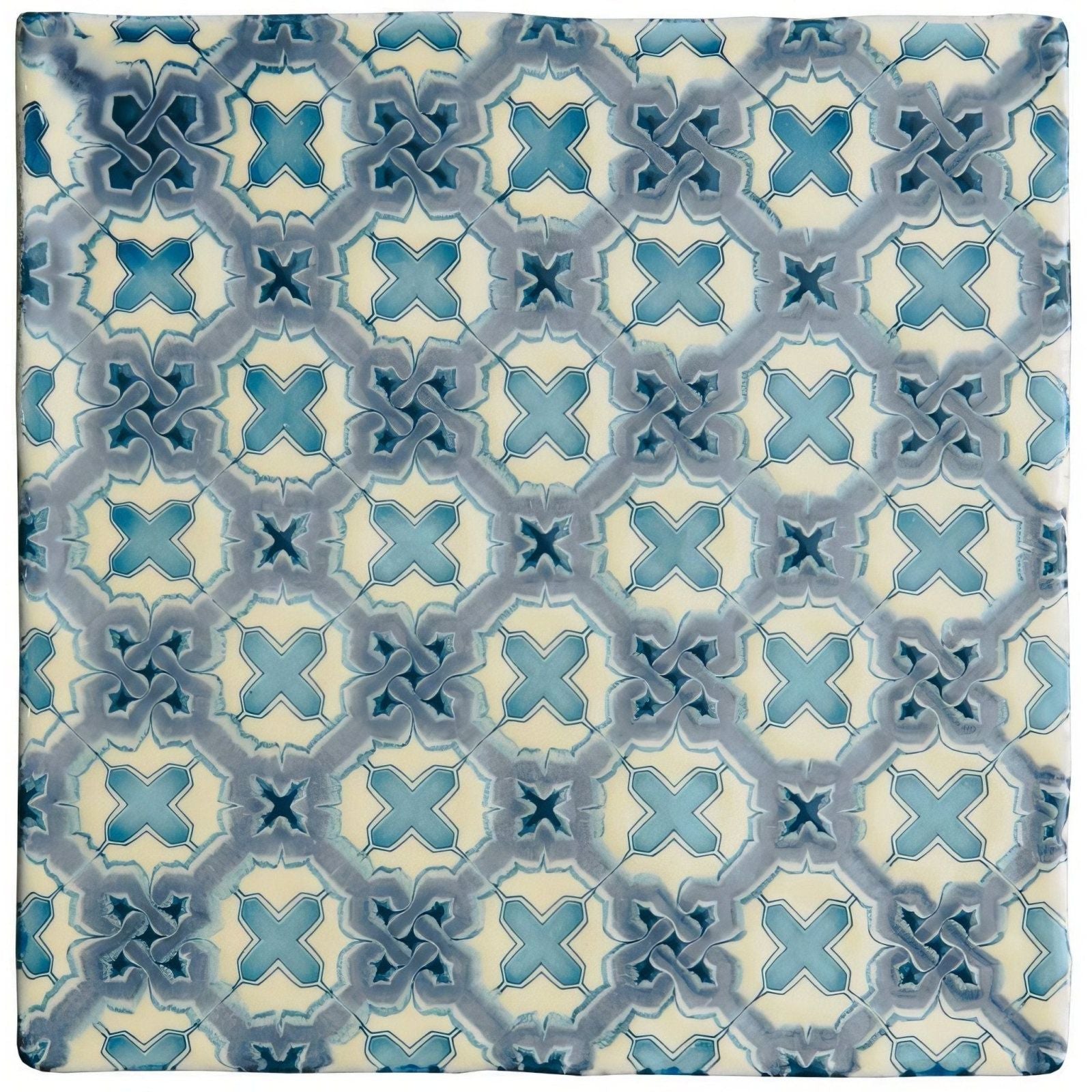 Square ceramic tile ormaux on palomino with a repeating geometric pattern in shades of blue and cream