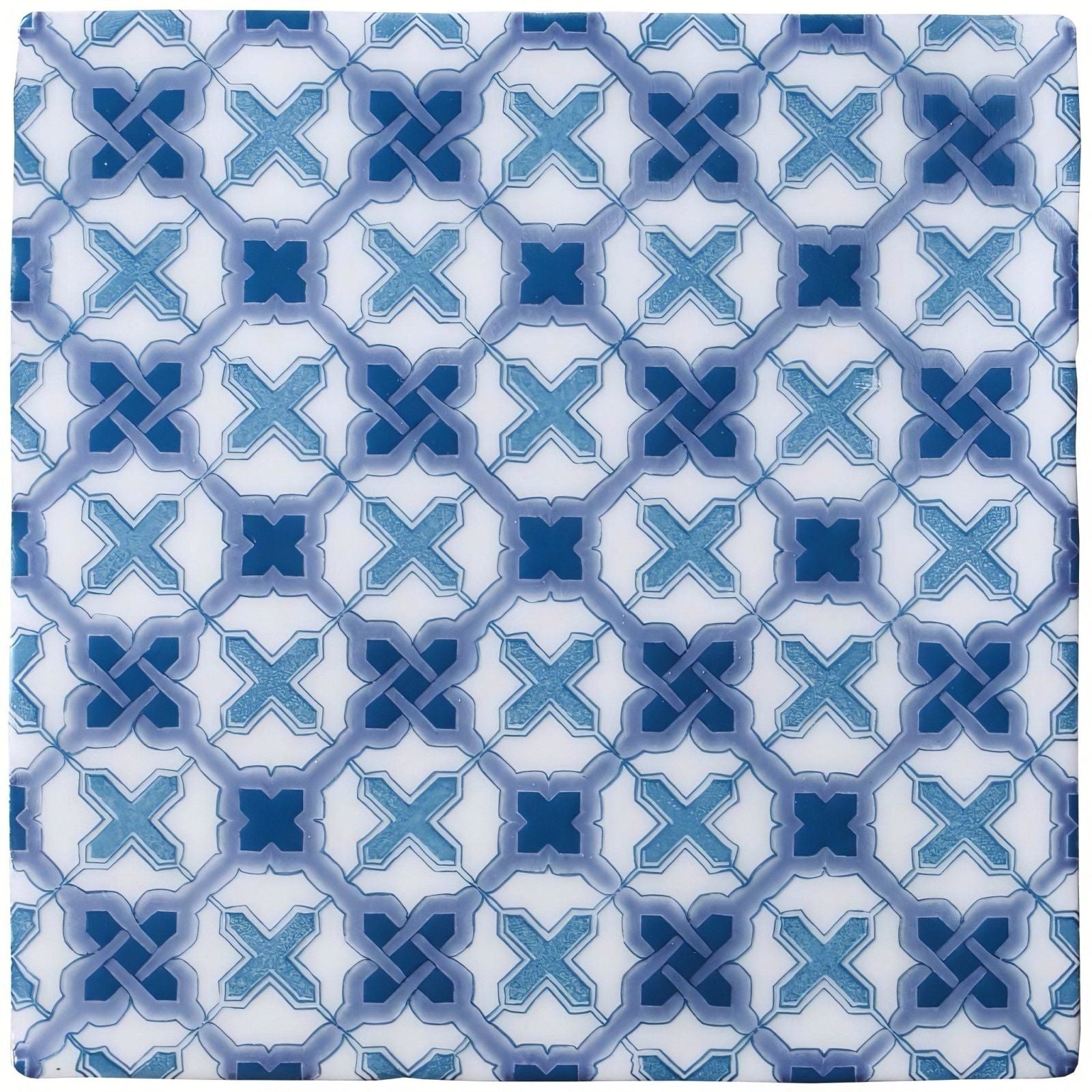 Blue and white ceramic tile ormeaux on papyrus featuring a repeating geometric pattern of interlocking x-shapes