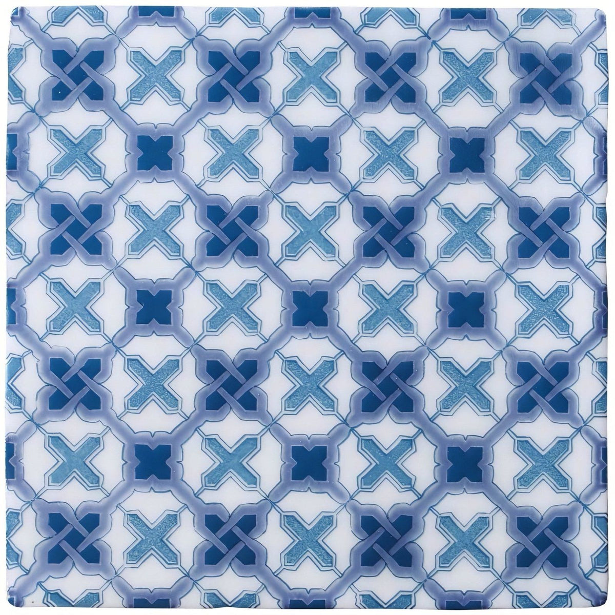 Blue and white ceramic tile ormeaux on papyrus featuring a repeating geometric pattern of interlocking x-shapes