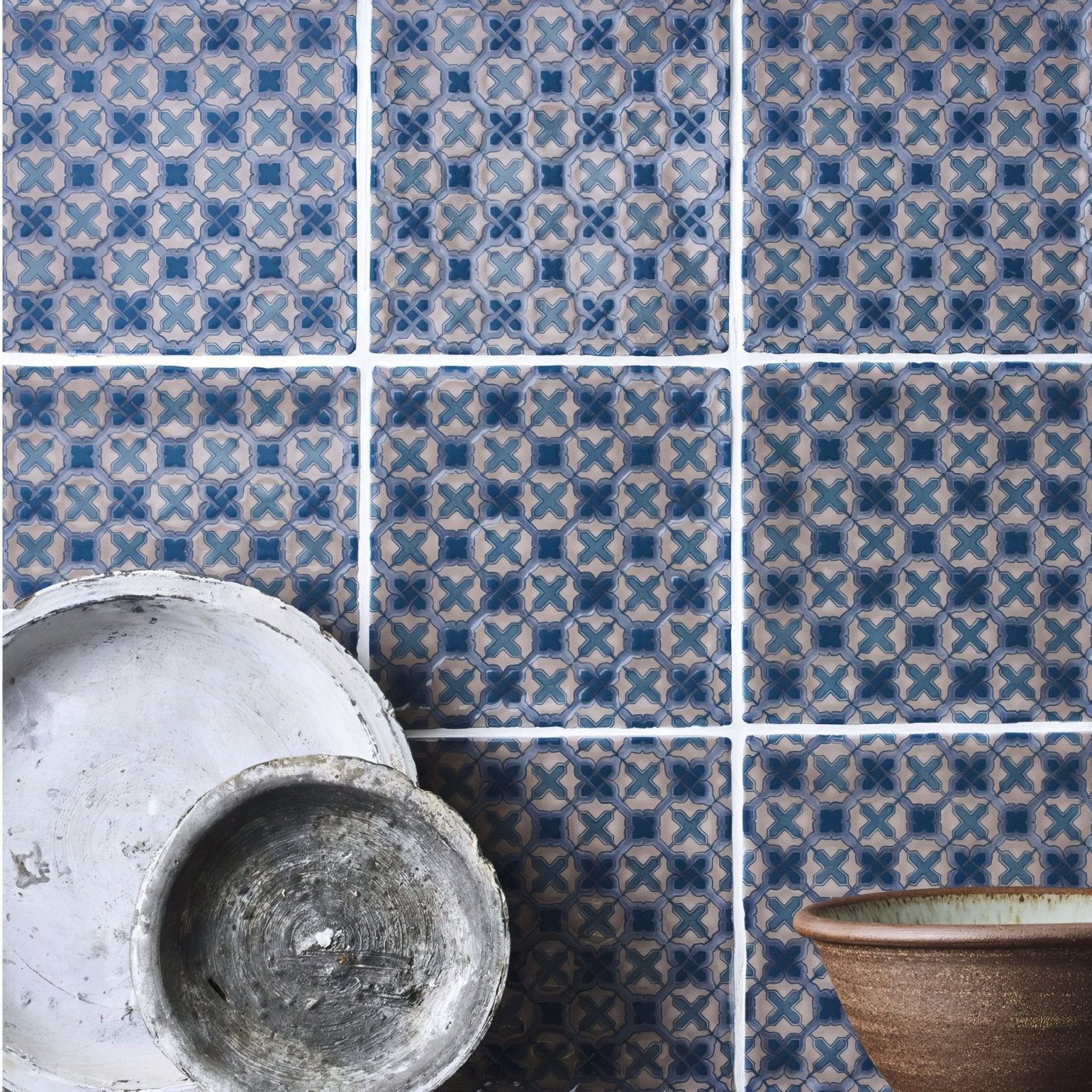 Blue and white patterned ceramic tiles with geometric cross design from ormeaux on truffle collection