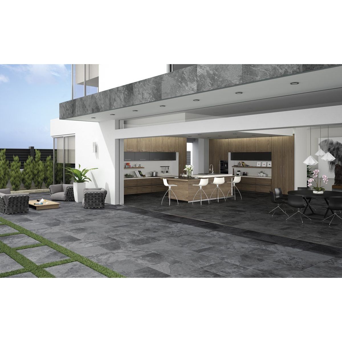 Modern gray oxford black 20mm stone paving tiles with natural textured finish on outdoor patio area