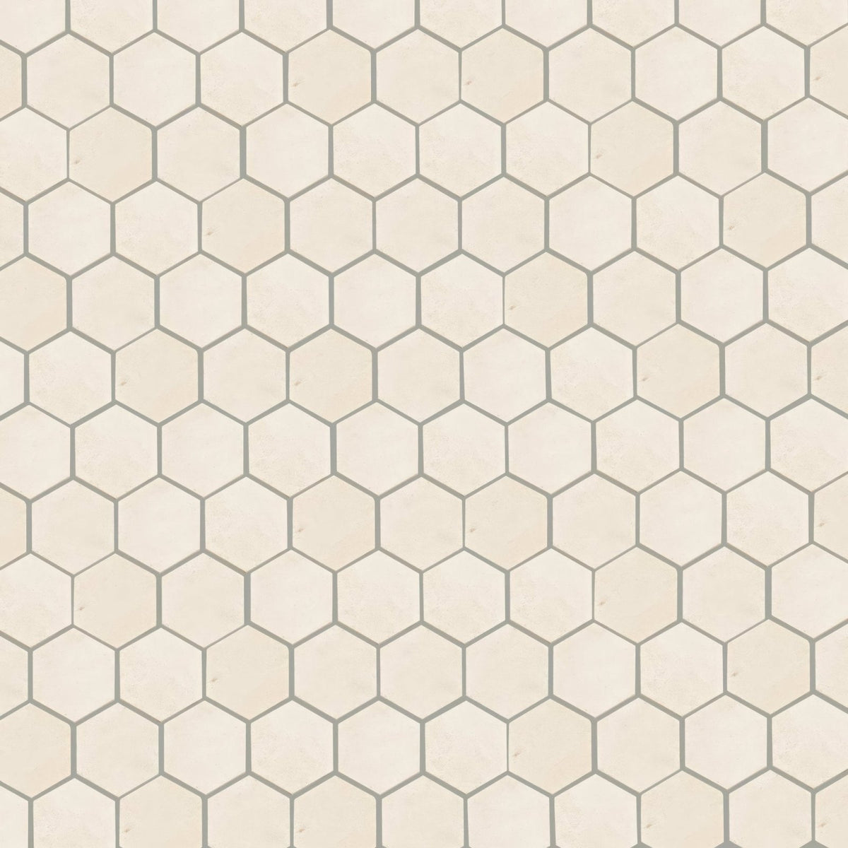 Beige palio limestone hexagon mosaic tile with thin gray grout lines and natural stone texture for wall or floor use
