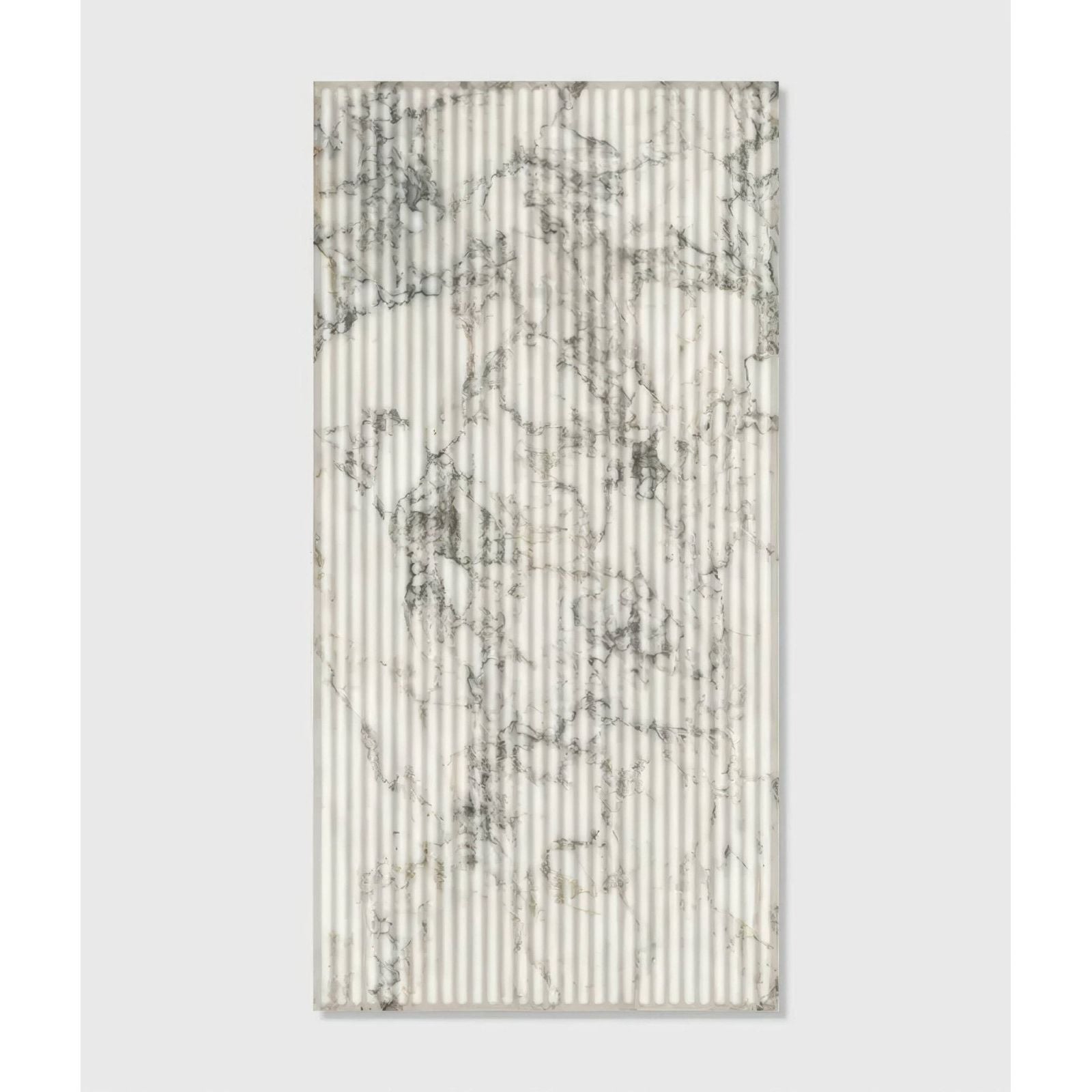 A rectangular palm springs porcelain italiana fluted panel with white and gray marble pattern on vertical corrugated ridges