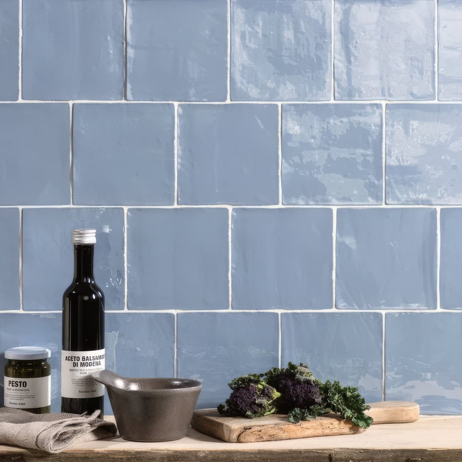 Blue ceramic subway tiles with a matte slightly textured finish from the pansy field tile collection