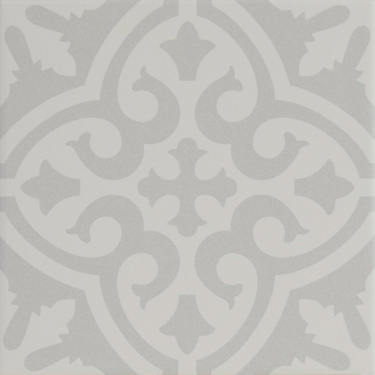 Gray ornamental tile with symmetrical vintage-inspired swirling vines and leaf motifs from Parisian Chic porcelain Angelina collection