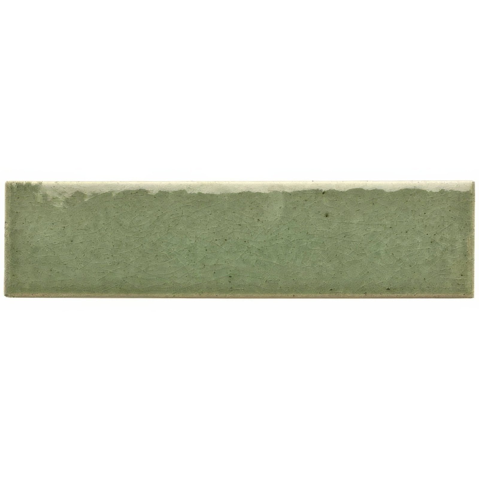 Pasture brick tile is a rectangular matte-finished sage green ceramic tile with a subtly textured surface and uneven edge