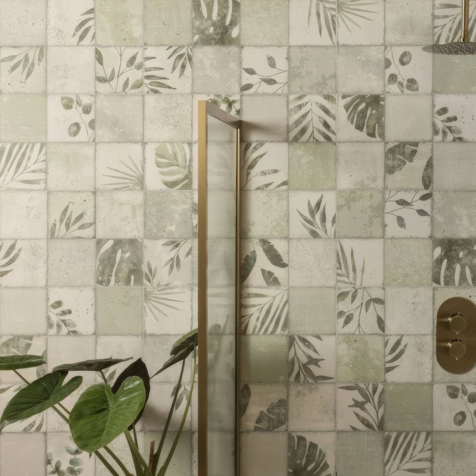 The wall is adorned with patchwork botanical ivy 60x30cm square tiles featuring a muted green and beige botanical pattern