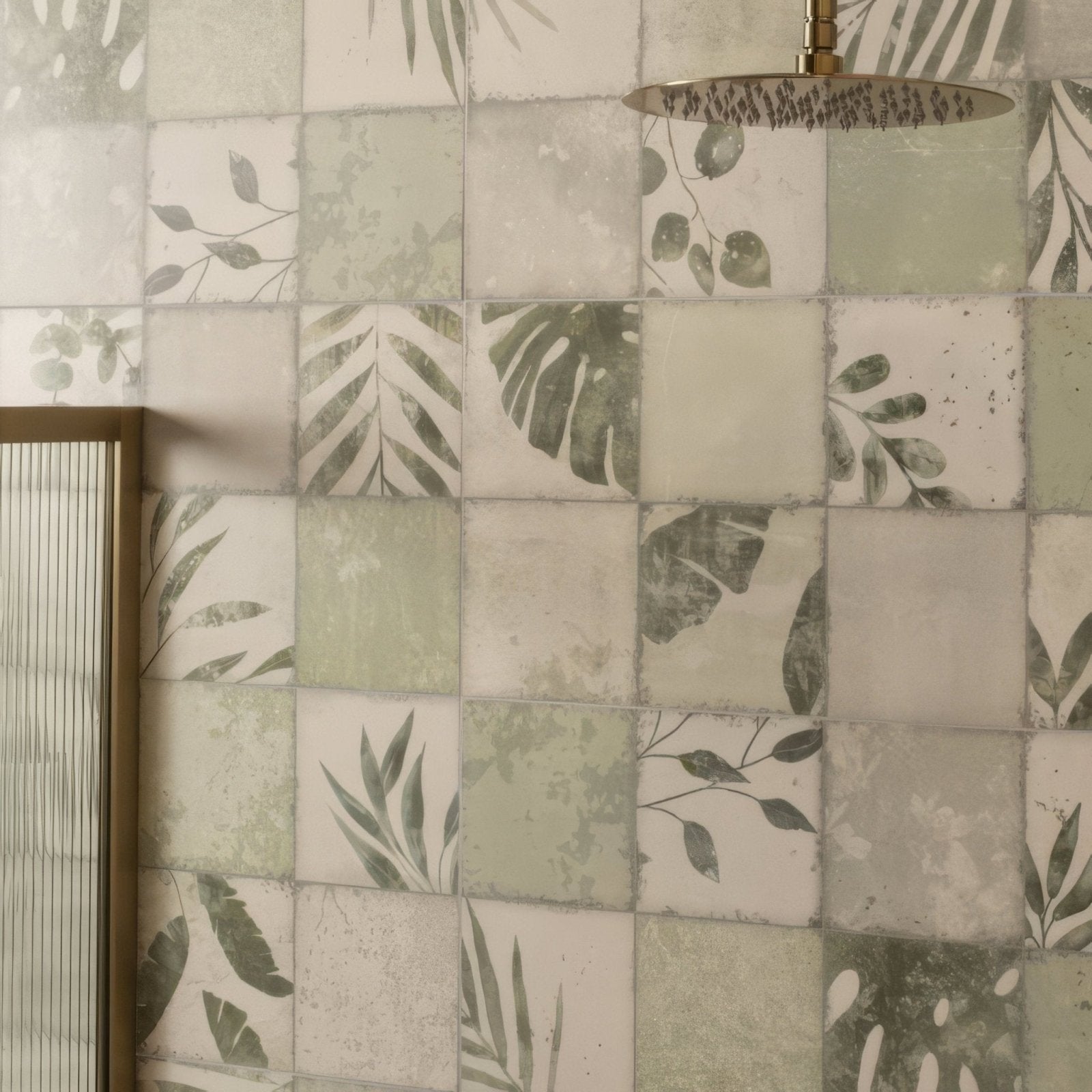 A sleek round brass showerhead with a textured surface and spray holes in the patchwork botanical ivy 60x30cm model