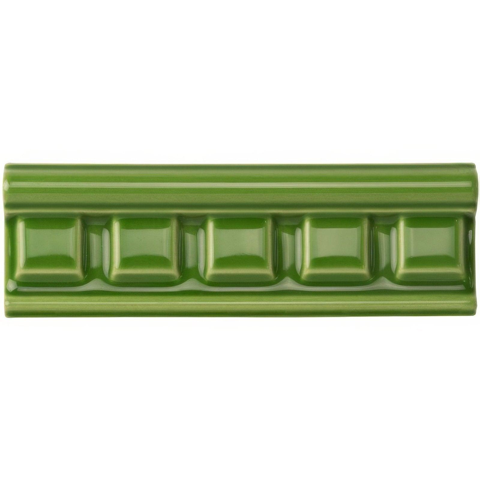 A glossy olive green ceramic pavilion green dentil moulding tile with raised rectangular decorative pattern