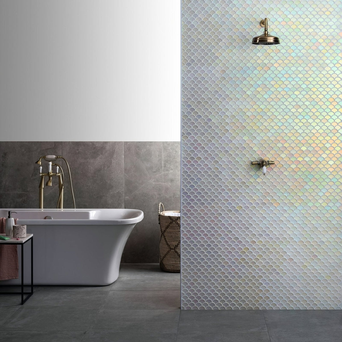 Pearl scale frosted iridescent fish scale mosaic tiles with blue and gold hues on shower wall creating shimmering effect