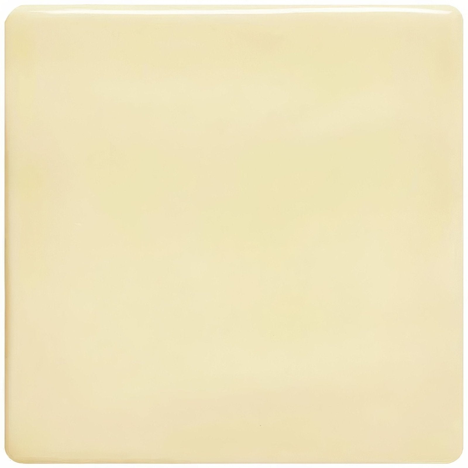 Cream-colored glossy square peridot field tile with smooth edges and uniform surface for wall or floor use
