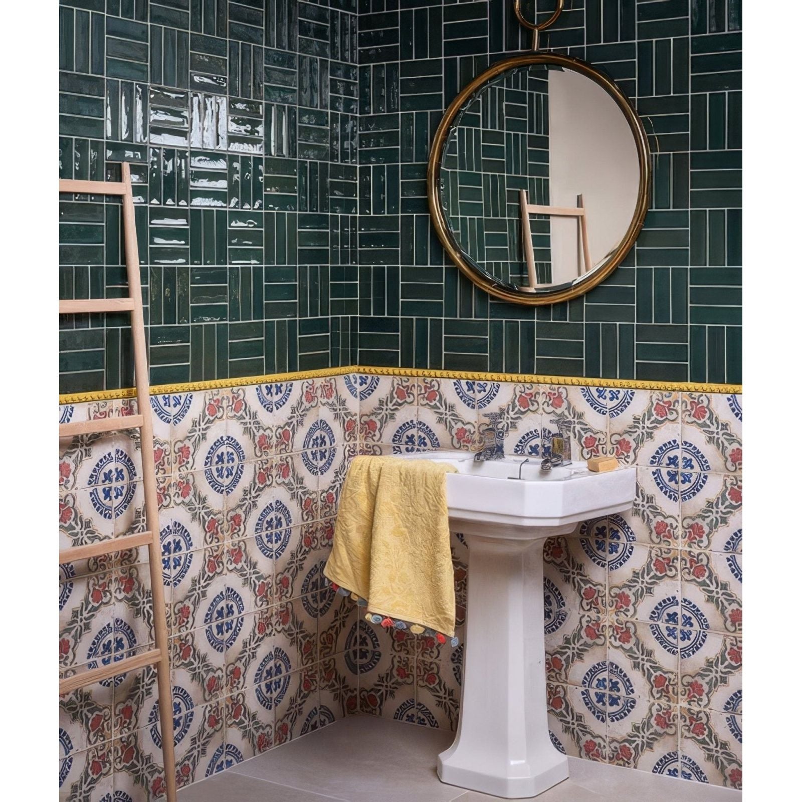 Petite porcelain gloss green white pedestal sink with chrome faucet and yellow towel draped over edge