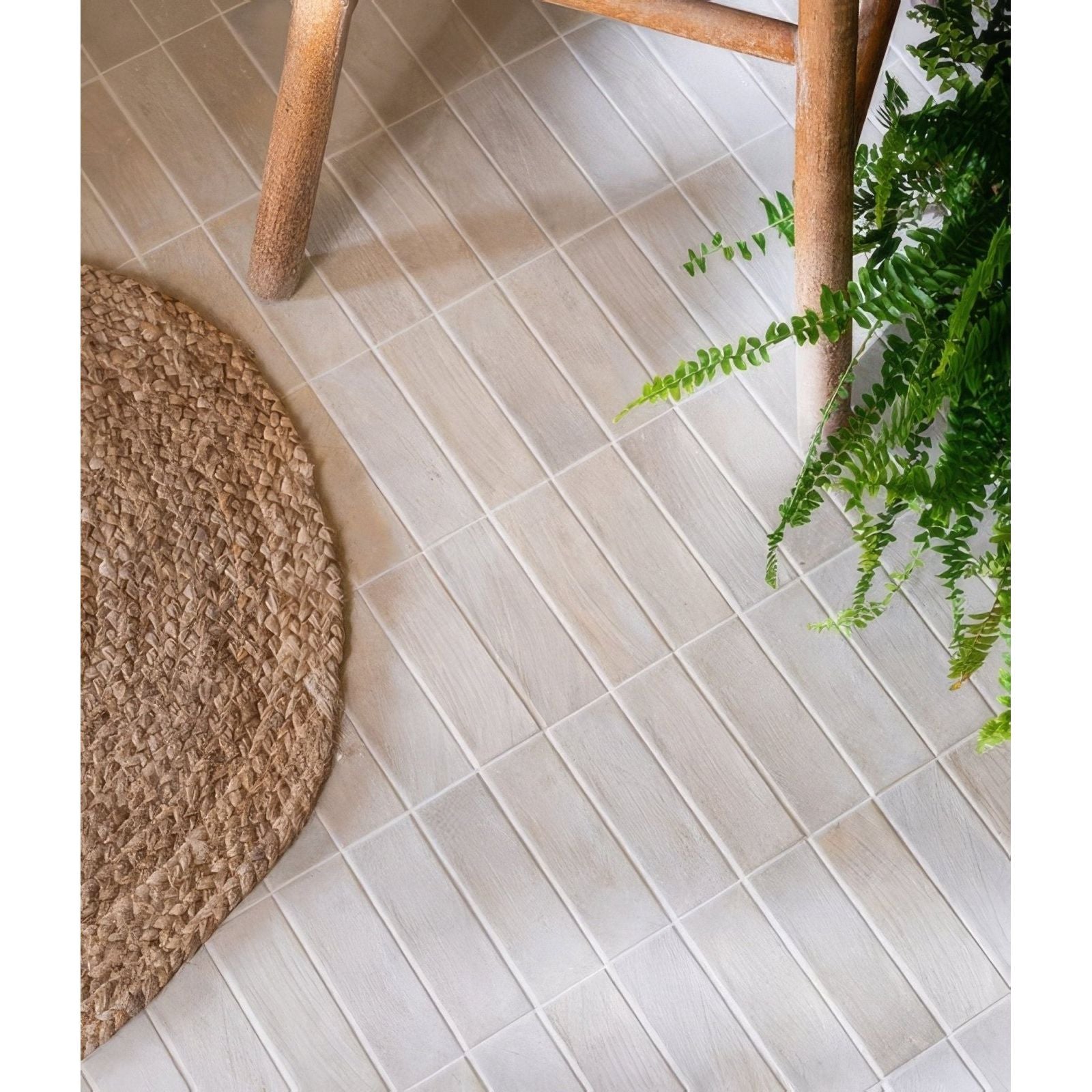 Light beige petite porcelain matt cotto light rectangular floor tiles with subtle matte finish and linear texture arranged in rows