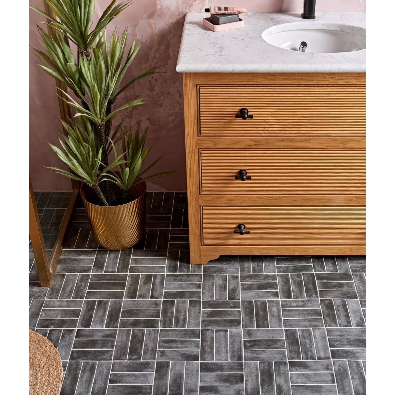 Gray herringbone patterned porcelain floor tiles in matt graphite finish ideal for stylish indoor flooring