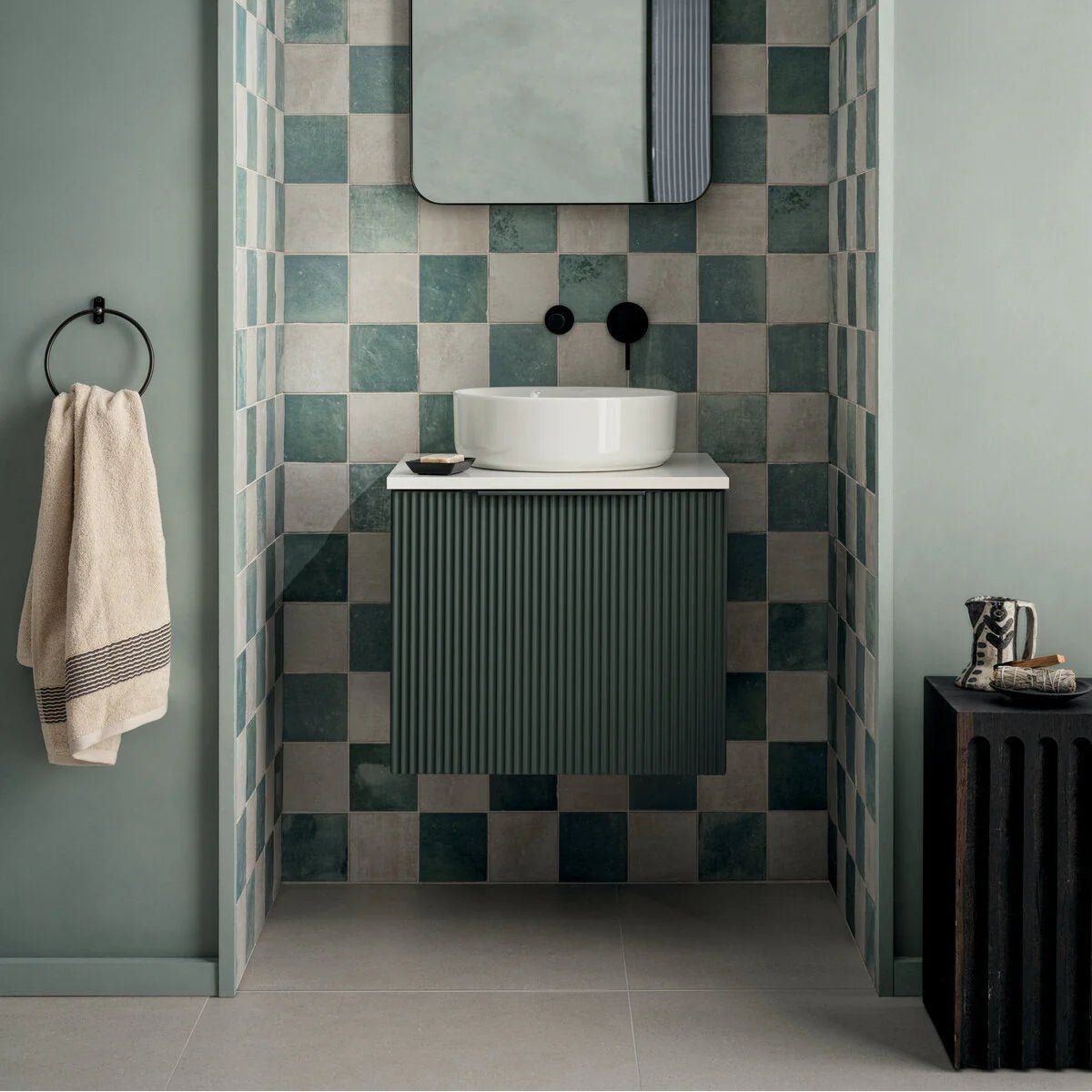 White ceramic vessel sink with sleek modern design mounted on dark green ribbed vanity cabinet piazza bone 60 x 60cm
