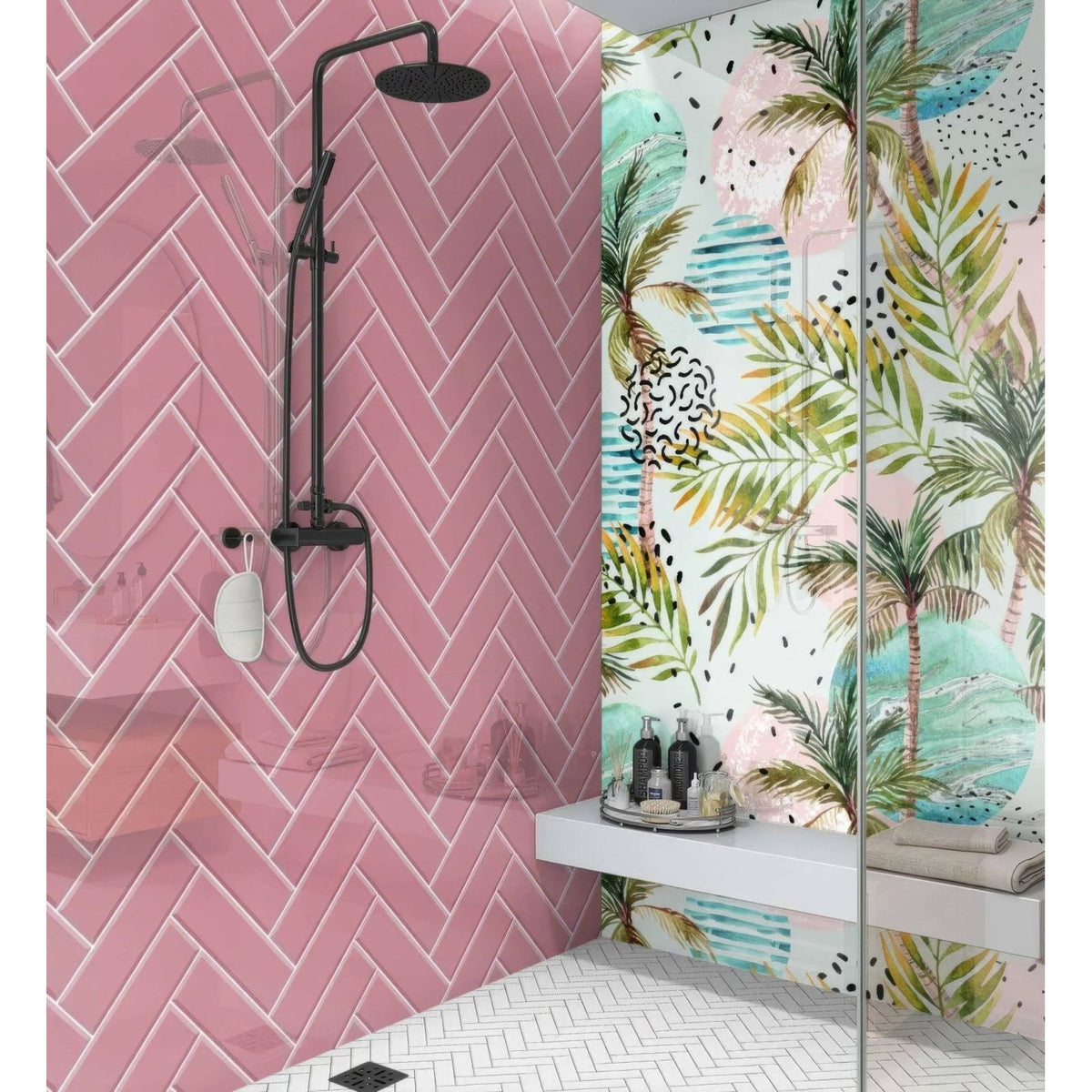 Black matte finish showerhead with curved arm and circular spray head mounted on pink herringbone tiled wall