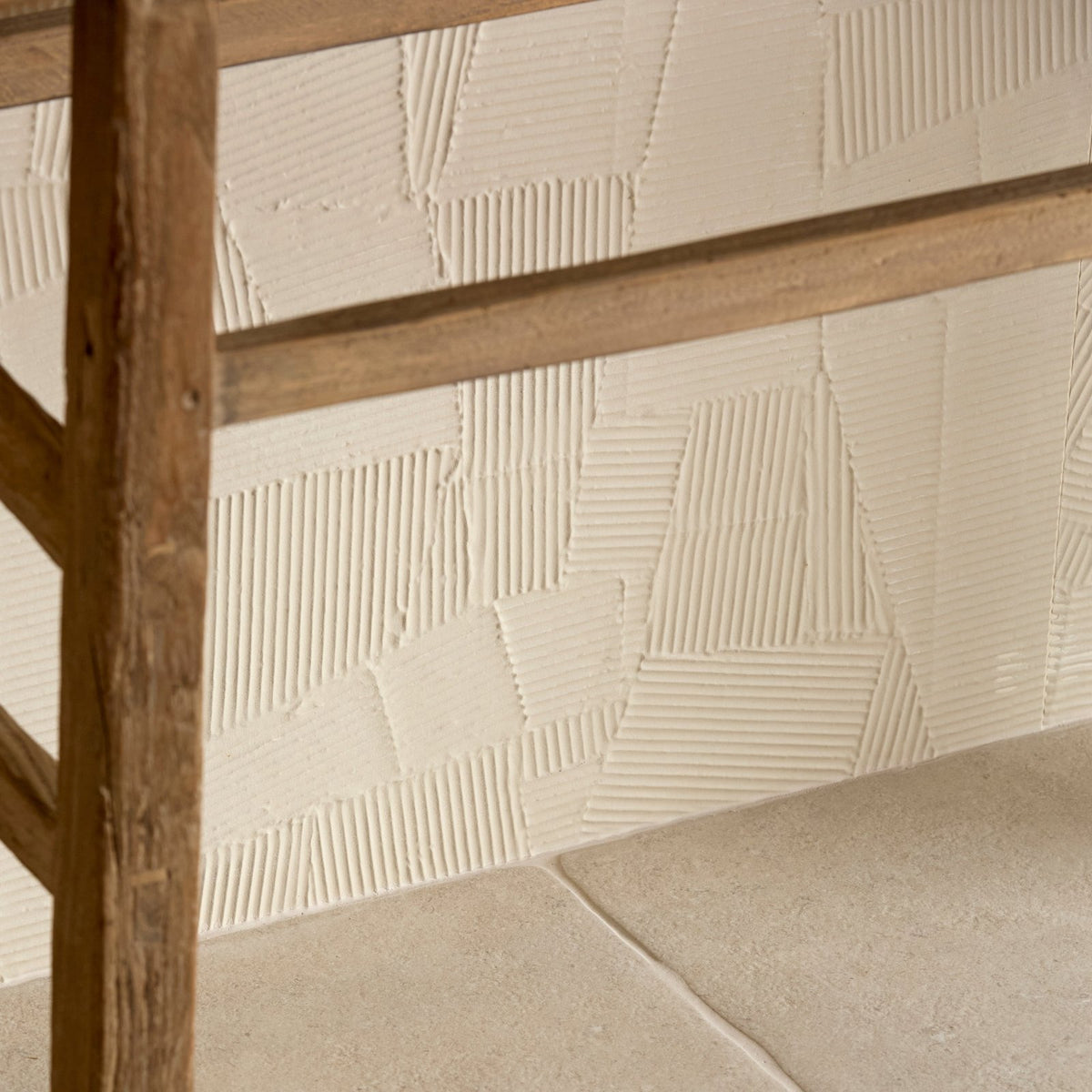 Beige textured porcelain wall tiles with geometric ridged patterns from plastercraft calco sabbia collection