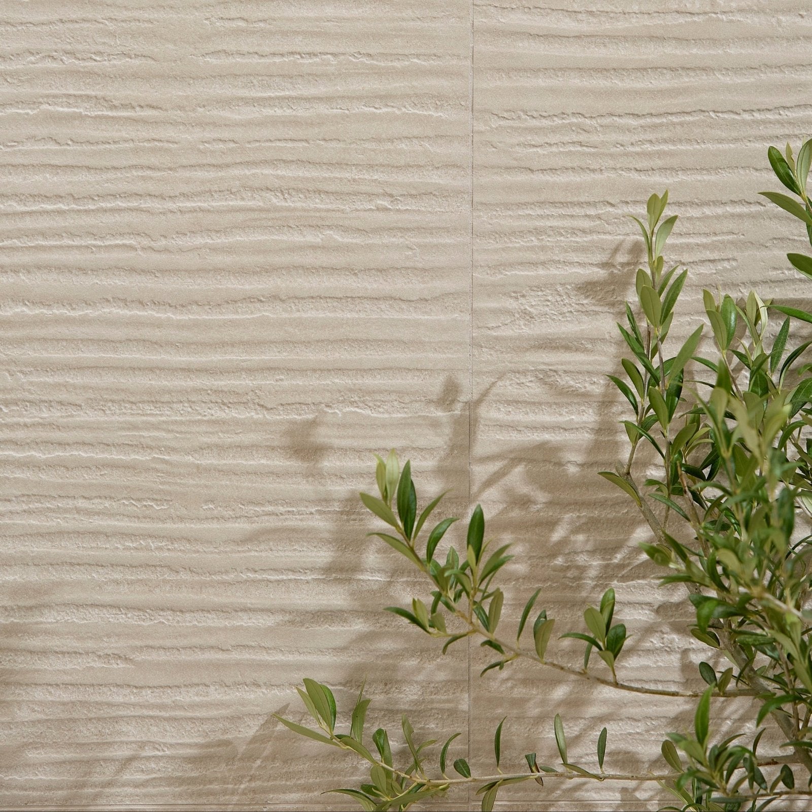 Beige plastercraft linea mano porcelain mink textured wall tiles with subtle horizontal ridges for interior use