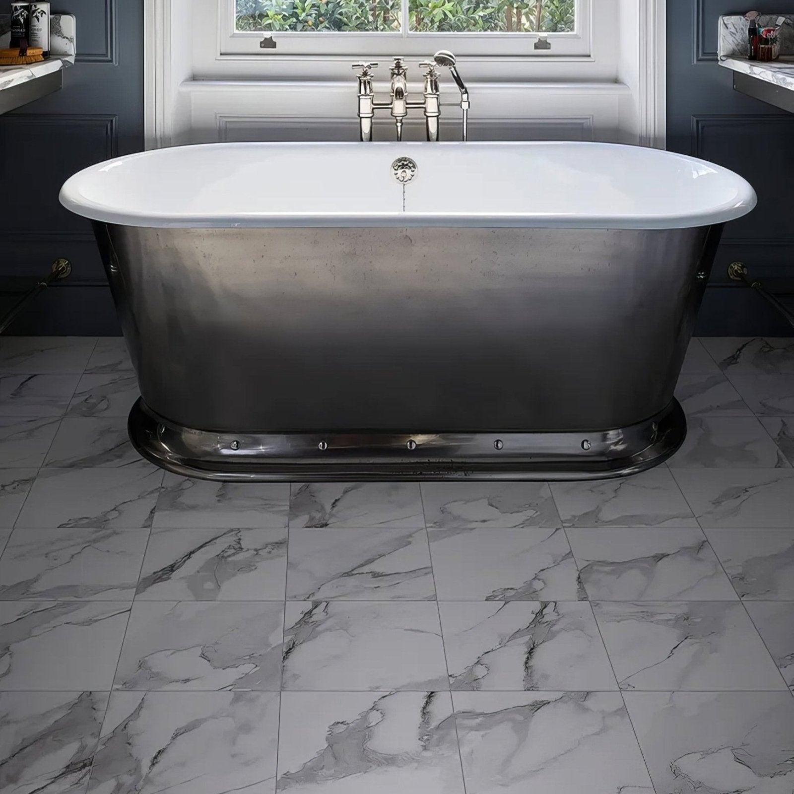 Butler Porcelain Calacatta white and grey marble-effect porcelain tiles with a freestanding bathtub